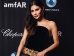 At the Pre-amfAR event, Mouni Roy captivated in a strapless black look. (Instagram/ Chopard)