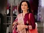 Nita Ambani poses in a purple salwar kameez. Nita Ambani poses in a purple salwar kameez.