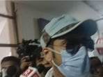 Visuals show Singh arriving wearing a cap, sunglasses, gamcha and face mask.