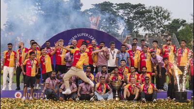 East Bengal players celebrate with the ISL trophy in Kolkata on Friday. (PTI) East Bengal players celebrate with the ISL trophy in Kolkata on Friday. (PTI)