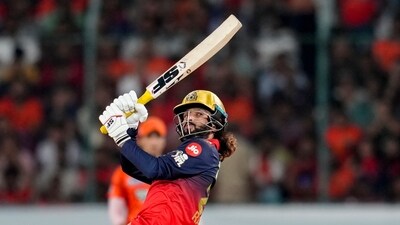After a certain point, RCB lost interest in trying to hunt down 256, turning their attention to the magic number of 166 instead. Rajat Patidar scored a composed 56, enough to get them to that mark, as the playoff picture is 75% set. (PTI) After a certain point, RCB lost interest in trying to hunt down 256, turning their attention to the magic number of 166 instead. Rajat Patidar scored a composed 56, enough to get them to that mark, as the playoff picture is 75% set. (PTI)