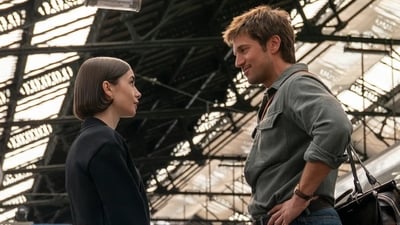 Lily Collins and Lucas Bravo in Emily in Paris Lily Collins and Lucas Bravo in Emily in Paris