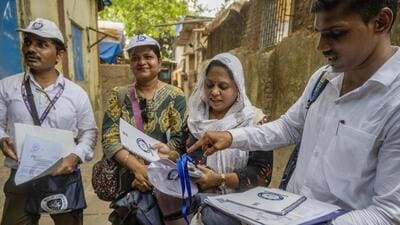 iiMumbai, India - May 16, 2026: In areas such as Ramabai Ambedkar Nagar ward, teachers appointed for the census duty are doing recce of their assigned locations on day 1 of census in city along with Asha workers in Mumbai, India, on Saturday, May 16, 2026. (Photo by Satish Bate/ Hindustan Times) (Hindustan Times) iiMumbai, India - May 16, 2026: In areas such as Ramabai Ambedkar Nagar ward, teachers appointed for the census duty are doing recce of their assigned locations on day 1 of census in city along with Asha workers in Mumbai, India, on Saturday, May 16, 2026. (Photo by Satish Bate/ Hindustan Times) (Hindustan Times)