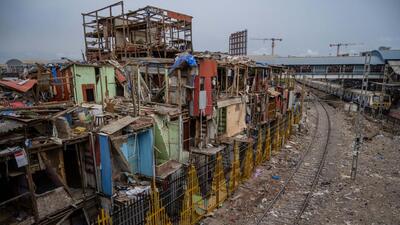 iiiMumbai, India - May 22, 2026: Western Railway launched a massive, multi-day anti-encroachment drive in Bandra's Garib Nagar slum to clear hundreds of unauthorised structures for Bandra Terminus expansion. As part of the clearance, railway authorities identified and spared 100 legally protected huts whose residents were verified in a 2021 survey in Mumbai, India, on Friday, May 22, 2026. (Photo by Satish Bate/ Hindustan Times) (Hindustan Times) iiiMumbai, India - May 22, 2026: Western Railway launched a massive, multi-day anti-encroachment drive in Bandra's Garib Nagar slum to clear hundreds of unauthorised structures for Bandra Terminus expansion. As part of the clearance, railway authorities identified and spared 100 legally protected huts whose residents were verified in a 2021 survey in Mumbai, India, on Friday, May 22, 2026. (Photo by Satish Bate/ Hindustan Times) (Hindustan Times)