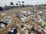 Garbage strewn along the Airport Road near TDI City. (Ravi Kumar/ HT)