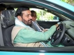 Haryana chief minister Nayab Singh Saini drives an electric car (EV), at Haryana Bhawan, in New Delhi on Friday. (ANI)