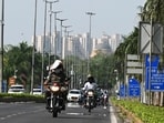 Mirage appears on road amid scorching temperatures due to the intense heatwave,at Shantipath, Chanakyapuri  in New Delhi, India.