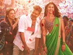 Mamitha Baiju, Vijay, and Pooja Hegde in a still from the song Thalapathy Kacheri in Jana Nayagan. 
