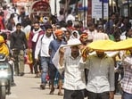 People walk amidst severe heatwave conditions on a hot summer day in Varanasi. (P) People walk amidst severe heatwave conditions on a hot summer day in Varanasi. (P)