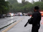 Police and members of the Secret Service block streets around the White House, Saturday, May 23, 2026, in Washington.