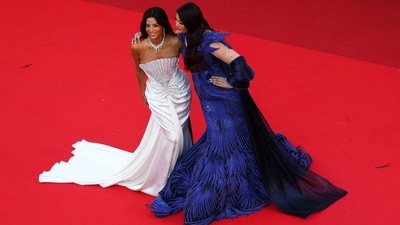 Eva Longoria and Aishwarya Rai pose on the red carpet during arrivals for the screening of the film Histoires de la nuit. Eva wore a stunning white gown.&nbsp; (REUTERS)