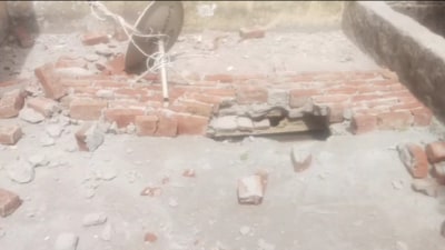 FIR will be registered against the building owner whose wall collapsed. (HT Sourced Photo/CCTV screen grab) FIR will be registered against the building owner whose wall collapsed. (HT Sourced Photo/CCTV screen grab)