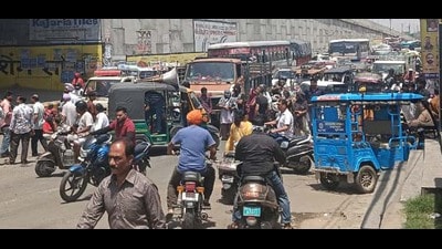 Residents staging a protest on Tibba Road in Ludhiana on Saturday. (HT Photo)