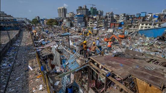iiiMumbai, India - May 23, 2026: Western Railway launched a massive, multi-day anti-encroachment drive in Bandra's Garib Nagar slum to clear hundreds of unauthorised structures for Bandra Terminus expansion. As part of the clearance, railway authorities identified and spared 100 legally protected huts whose residents were verified in a 2021 survey in Mumbai, India, on Saturday, May 23, 2026. (Photo by Satish Bate/ Hindustan Times) (Hindustan Times)
