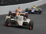 Felix Rosenqvist, of Sweden, heads into the first turn during practice for the Indianapolis 500 auto race at Indianapolis Motor Speedway in Indianapolis, Sunday, May 24, 2026.