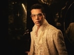 Karan Johar emphasises that success comes with burdens and tension, while failure offers freedom. 