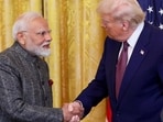 US President Donald Trump and Prime Minister Narendra Modi shake hands as they attend a joint press conference at the White House in Washington.