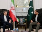 FILE: The handout photo shows Pakistan's Army Chief and Field Marshal Syed Asim Munir (R) meeting with Iran's Foreign Minister Abbas Araghchi upon his arrival in Islamabad. 