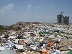 The report said legacy waste at the landfill increased to 1.38 million tonnes between July and December last year. (Parveen Kumar/HT)