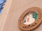 The seal of Pima County on the day of a discussion regarding concerns related to Sheriff Chris Nanos' work history, including the Nancy Guthrie case, management of the Pima County Sheriff's Department and interaction with federal immigration officials, during a Pima County Board of Supervisors meeting, at the Pima County Administrator’s Building in Tucson, U.S., May 12, 2026.  REUTERS/Rebecca Noble