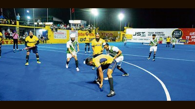 Hockey players in action during the tournament at Jarkhar Sport Stadium in Ludhiana. (HT PHOTO)