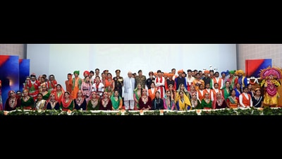 Jammu and Kashmir Lt. Governor Manoj Sinha with artists at NCC's National Integration Camp, in Srinagar on Sunday. = (ANI)