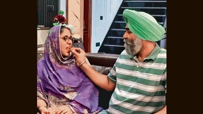 Parents of the sprinter, Gurindervir Singh, celebrate their son's victory at their Jalandhar home. (ANI) Parents of the sprinter, Gurindervir Singh, celebrate their son's victory at their Jalandhar home. (ANI)