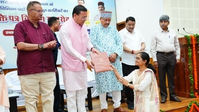 Uttarakhand Chief Minister Pushkar Singh Dhami distributes appointment letters to candidates selected for irrigation and agriculture department posts at an event in Dehradun on Friday. Uttarakhand Chief Minister Pushkar Singh Dhami distributes appointment letters to candidates selected for irrigation and agriculture department posts at an event in Dehradun on Friday.