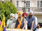 AAP leaders and workers during a rally in Mohali on Sunday. (HT Photo)
