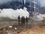 Firefighting team at the spot after an Air India plane crashed in Meghaninagar area, near Ahmedabad airport, Thursday, June 12, 2025.