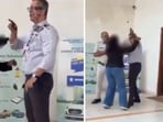 A woman employee was filmed attacking the GM of a Maruti showroom A woman employee was filmed attacking the GM of a Maruti showroom