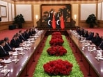 Chinese President Xi Jinping, center left, and Pakistan's Prime Minister Shehbaz Sharif, center right, attend at the Great Hall of the People, in Beijing, China.