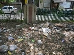 Illegally dumped single-use plastic waste along the green belt near traffic signal in Sector 40, seen earlier this month. (Parveen Kumar/HT) Illegally dumped single-use plastic waste along the green belt near traffic signal in Sector 40, seen earlier this month. (Parveen Kumar/HT)
