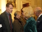 Lee Child talking to Britain's Queen Camilla during a reception for authors at Clarence House, London on Wednesday, March 25, 2026. (Aaron Chown/AP)