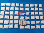 The 28.12 kg heroin recovered by Counter Intelligence(CI) Ferozepur. A Hyundai Creta car used to smuggle narcotics was also seized. (HT Photo)
