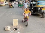 The portion of the road that caved in near Chhawani Mohalla in Ludhiana on Sunday. (Manish/HT)