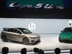 Attendees look at the Leapmotor new Lafa 5 Ultra models on stage after being unveiled by Leapmotor President Cao Li at the Auto China 2026, in Beijing, Friday, April 24, 2026.(AP)
