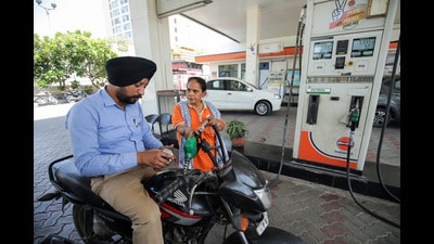 A commuter gets refuelling done at a filling station after fuel prices were hiked in Amritsar on Monday. (ANI) A commuter gets refuelling done at a filling station after fuel prices were hiked in Amritsar on Monday. (ANI)