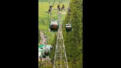 A rescue operation underway at Gulmarg Gondola after the cable car service got halted due to a fault. (PTI) A rescue operation underway at Gulmarg Gondola after the cable car service got halted due to a fault. (PTI)