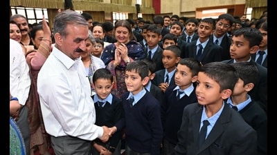 Chief minister meeting students at a government school in Chhota Shimla on Monday. (HT Photo) Chief minister meeting students at a government school in Chhota Shimla on Monday. (HT Photo)