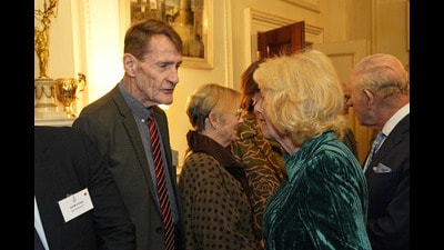 Lee Child talking to Britain's Queen Camilla during a reception for authors at Clarence House, London on Wednesday, March 25, 2026. (Aaron Chown/AP)