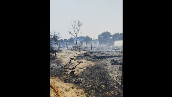 On reaching the spot, fire officials found around 30 to 40 nearby shanties engulfed in flames. “The fire was finally brought under control after an hour,” officials said. (HT Photos)
