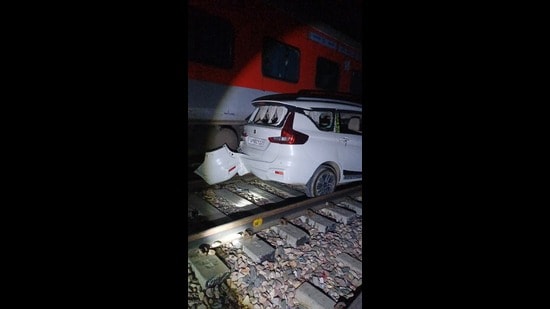 The damaged car after being struck by train in Mursan town of Hathras on Sunday night. (Sourced)