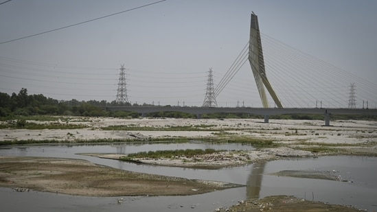 A view of the dried bed of the Yamuna River due to extreme heat conditions at Wazirabad in New Delhi, India, on Sunday, (Sanchit Khanna/ Hindustan Times)