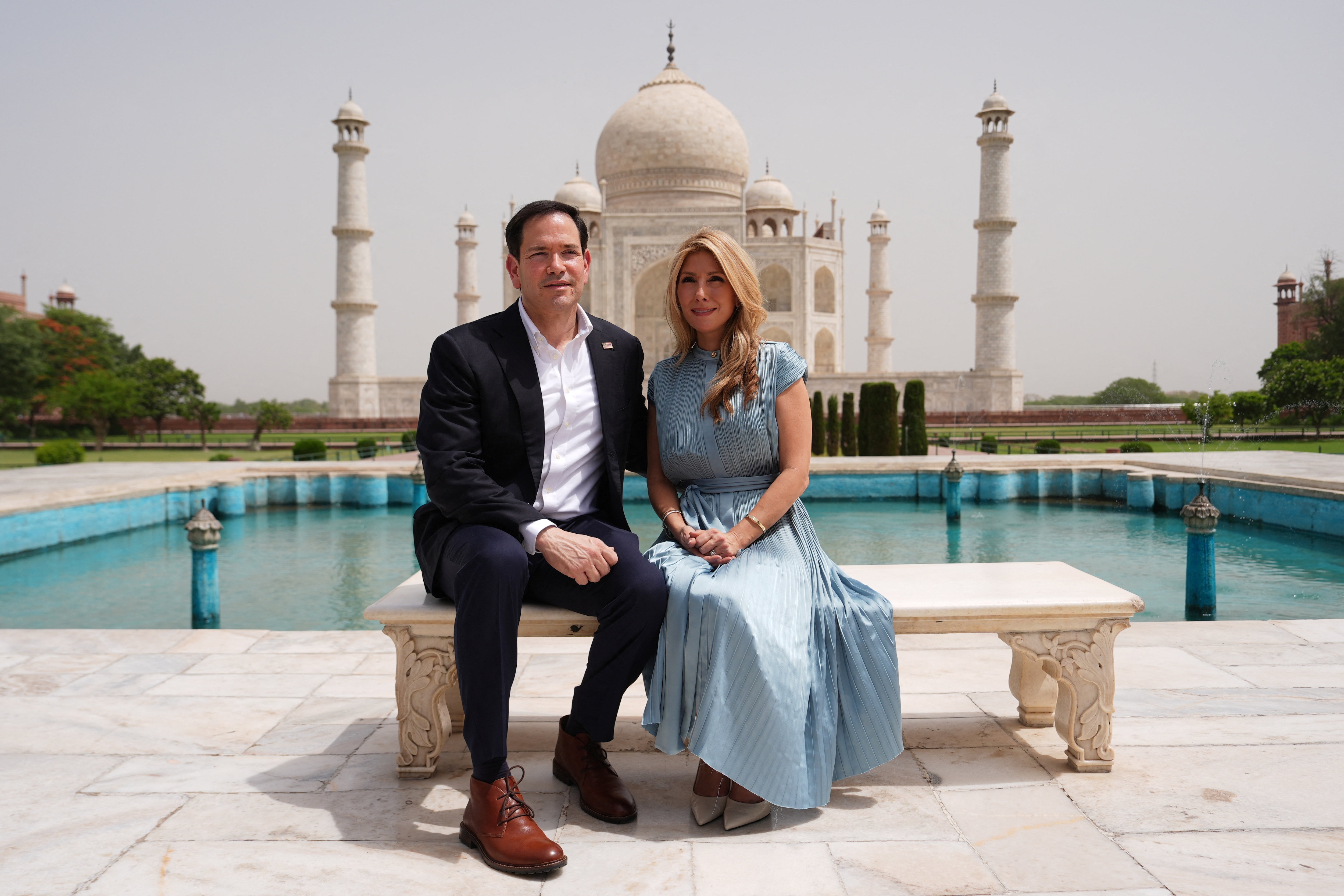 United States Secretary of State Marco Rubio poses with his wife, Jeanette Rubio, during their visit to the Taj Mahal in Agra, India, Monday, May 25, 2026.     Julia Demaree Nikhinson/Pool via REUTERS (via REUTERS)