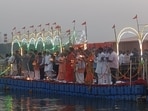 CM Yogi Adityanath performing Ganga Aarti at Sangam on Tuesday. (Anil Kumar Maurya/HT)