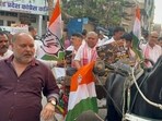 Congress workers launch signature drive in Ranchi over fuel price hike on Tuesday. (HT Photo)