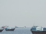 An explosion damaged a tanker close to its waterline as it sailed off Oman. 