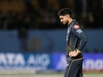 Shubman Gill looks dejected in the field during RCB's onslaught in Dharamshala.
