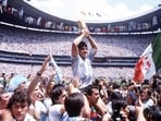 Diego Maradona with the 1986 World Cup trophy.